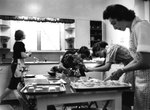 Home Management Students Preparing for Tea Serving ca. 1962 by Winthrop University