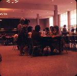Students Eating at Tables in Thomson Hall Cafeteria, late 1960s by Winthrop University